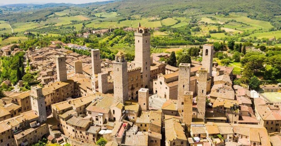 From Florence: Tuscany Day Trip with a Private Chauffeur - San Gimignano: the Town of Fine Towers and seven around Piazza del Duomo