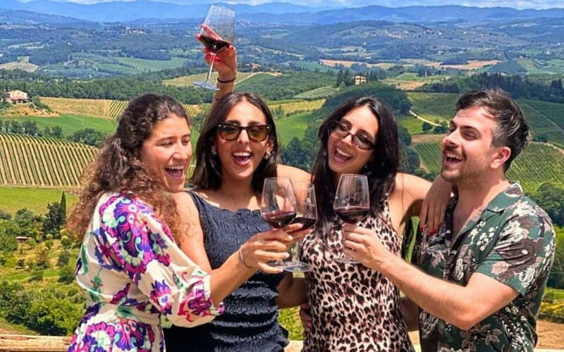 From Rome: Tuscany Wine Tour, San Gimignano & Florence - Chianti Hills winery stop: wine, olive oil, and vineyard views