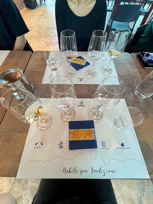 From Siena: Tuscany Hills Wine Tour - Winery stop one in Chianti: wine, olive oil education, and the first round of tastings