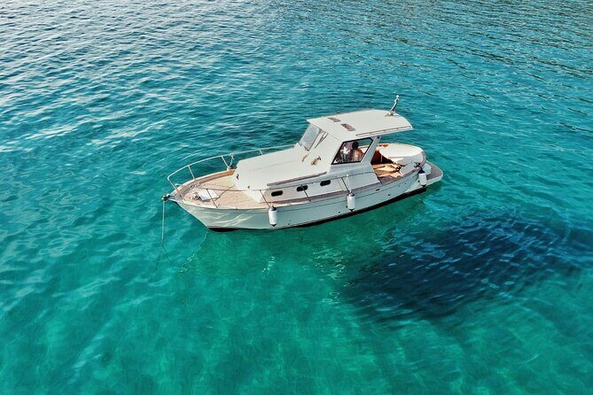 Private Boat Excursion with Lunch or Aperitif to the Calette di Scarlino - Stop 4: Spiaggia di Punta Ala for a calm corner near the port