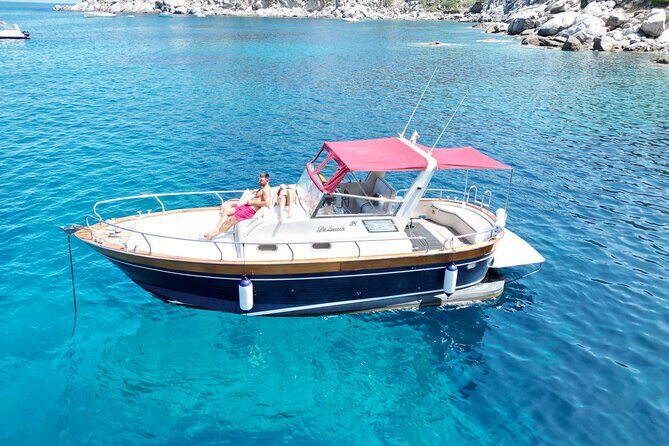 Private Boat Excursion with Lunch or Aperitif to the Calette di Scarlino - Stop 1: Cala Violina for shallow, sandy swimming that feels easy