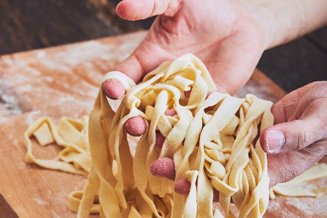 Private Home-Made Pasta Cooking Class in Pisa. - Welcome aperitivo: wine, snacks, and the Tuscan warm-up
