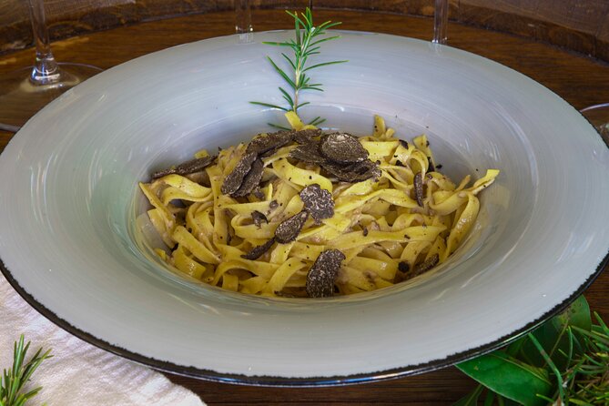 Private Wine & Evo oil tasting with Truffle Meal - From Via Martiri di Citerna to a private table with San Gimignano views