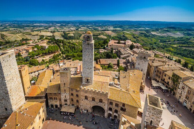 San Gimignano, Chianti and Montalcino Tour through Tuscan wine - Fortezza di Montalcino: walls, cobblestones, and a small paid upgrade