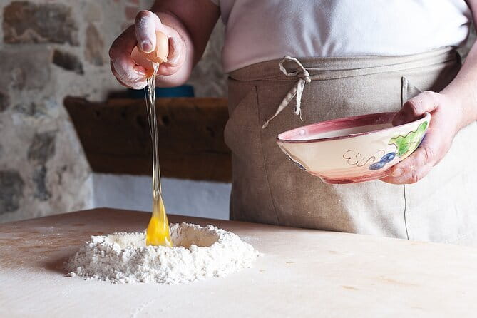 Small Group Pasta Making Class Wine Tasting in a Tuscan Castle - The first hour: castle grounds, cellars, and estate context