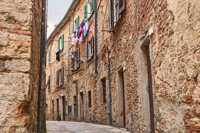 Tuscany countryside from Livorno: Private Volterra, San Gimignano & Wine Tasting - Private Day Trip from Livorno: What the Minivan Pickup Changes
